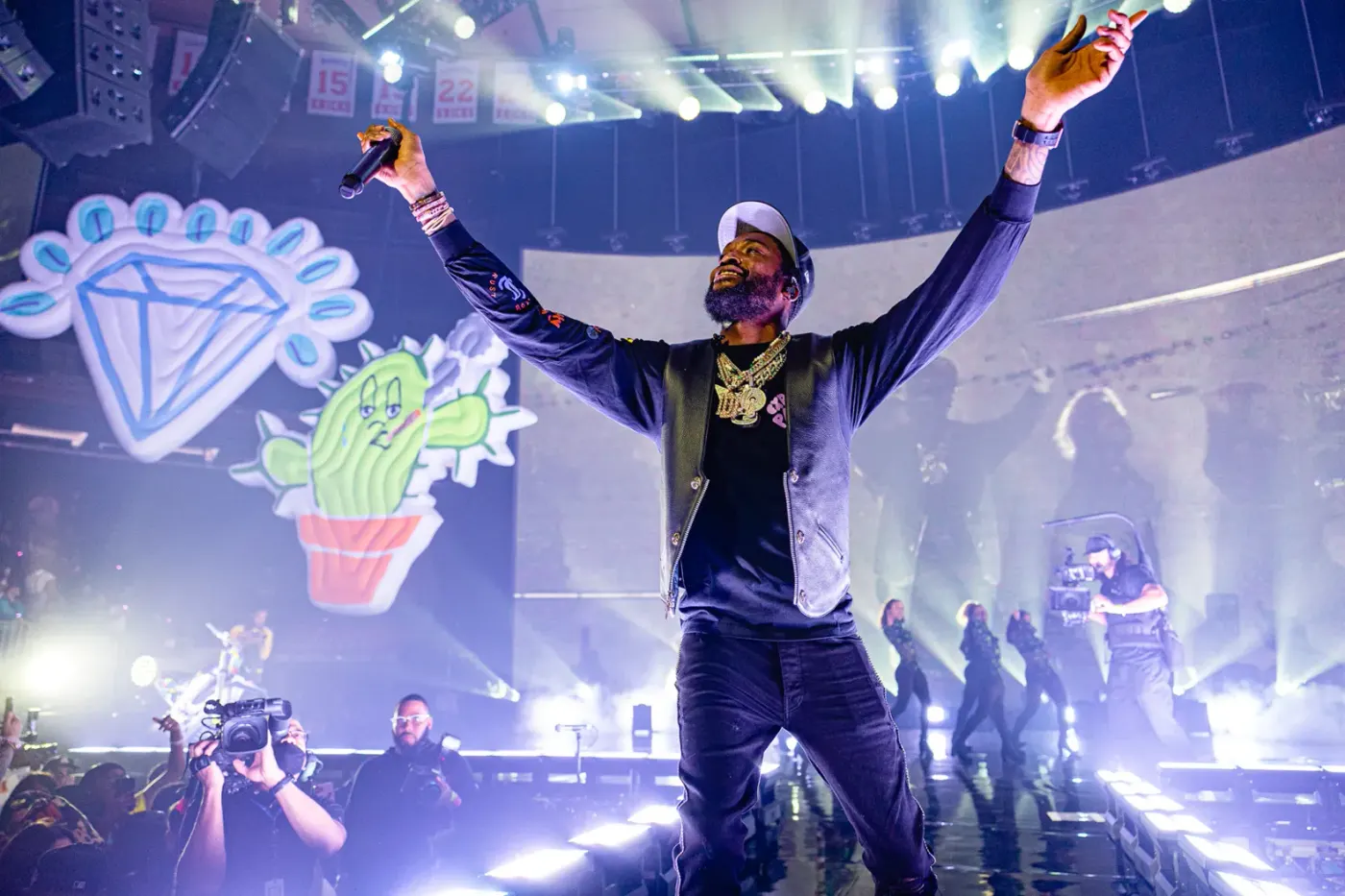 Meek Mill performing on stage